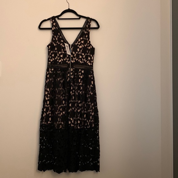 BRAND NEW. Chelsea v neck black lace dress. Tags still on. Retail:$178. - Picture 1 of 6
